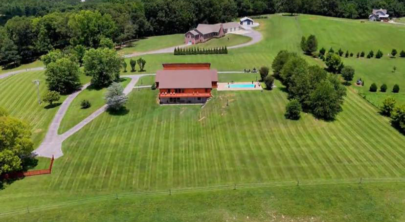 Freshly mowed lawn with visible mowing pattern